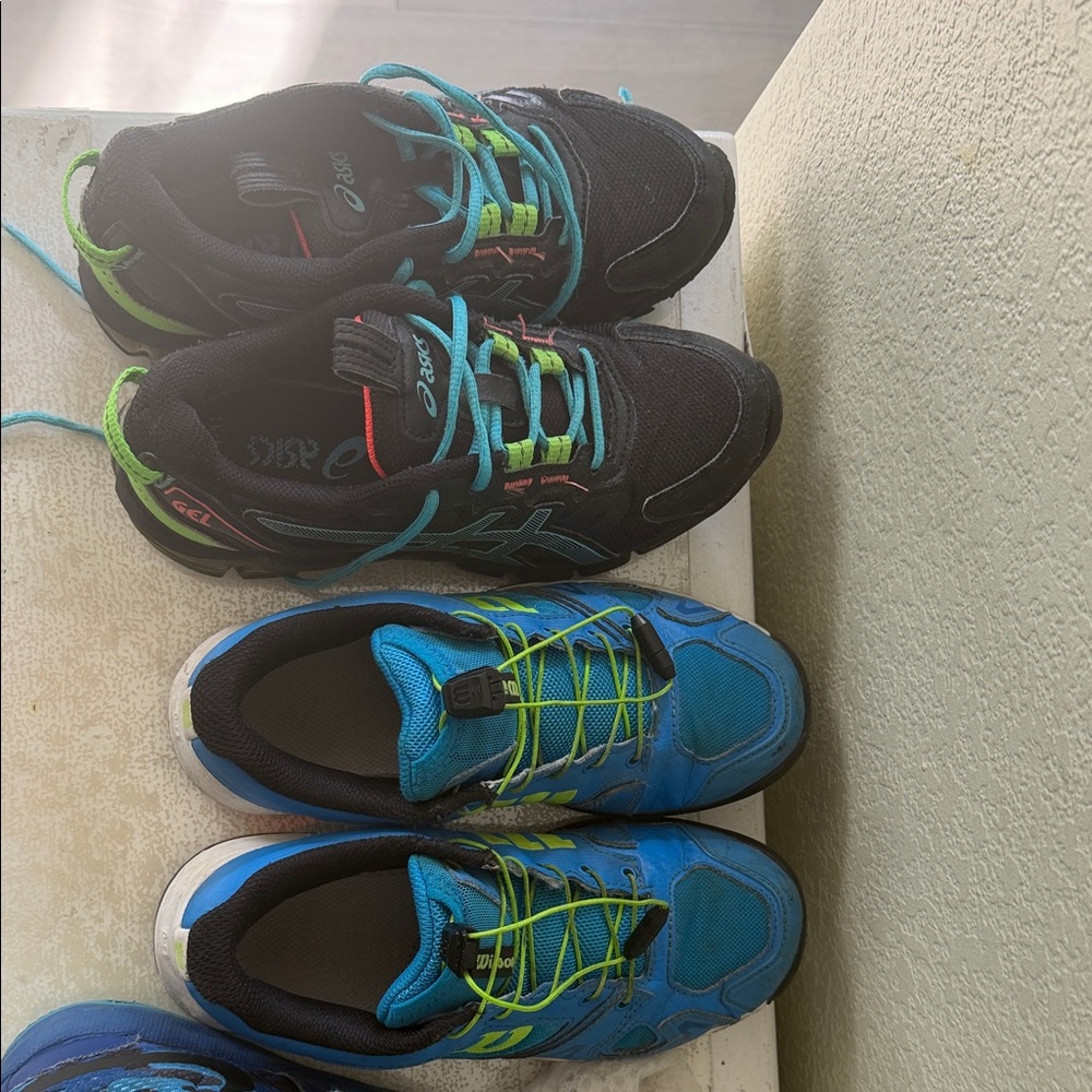 Two pairs of ASICS and Wilson Kids Sneakers - Black and Blue with Green Accents